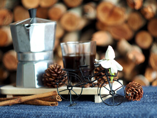 moka pot coffee maker morning fresh with firewoods background 