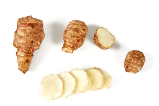 Jerusalem artichoke (topinambur) isolated on white background. Healhty food.