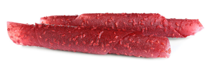 Delicious fruit leather rolls on white background