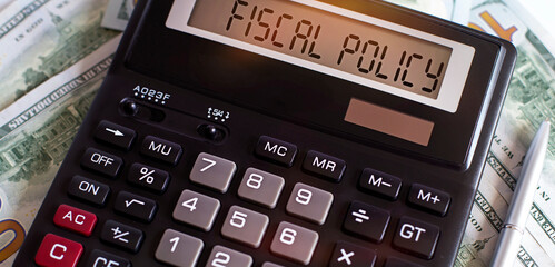 Calculator with the word FISCAL POLICY on the display