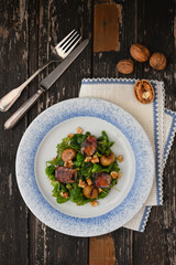 Chestnut salad with bacon and walnuts