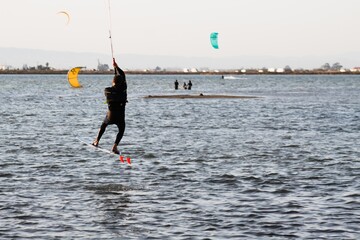 surfer kitesurfing at the beach