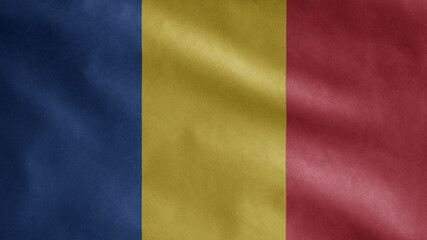 Romanian flag waving in the wind. Romania banner blowing soft silk.