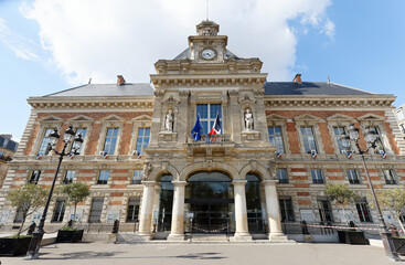 Fototapeta na wymiar 19th borough Town Hall located near the Buttes-Chaumont park, Paris, France.