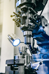 CNC lathe or Drilling lathe. High-tech processing concept.
