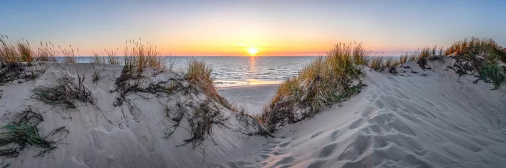 Foto auf Leinwand Sonnenuntergang am Dünenstrand © eyetronic