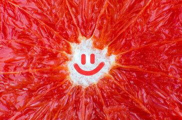 Smile on Grapefruit  background. Citrus close up photo. Healthy lifestyle photo. Beautiful...