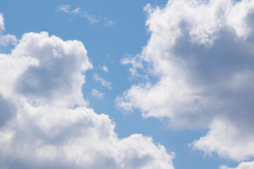 Fototapeta na wymiar Blue sky with clouds. Beautiful background with copy space.