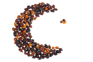 Muslim crescent moon made from dried fruits.