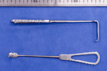 Langenbeck retractor on a blue background