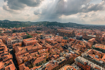 Obraz premium Bologna, Italy - September 7, 2020: Aerial view of historical city center with car traffic and old buildings