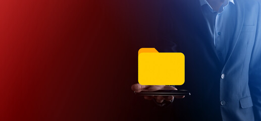 Businessman hold folder icon.Document Management System or DMS setup by IT consultant with modern...