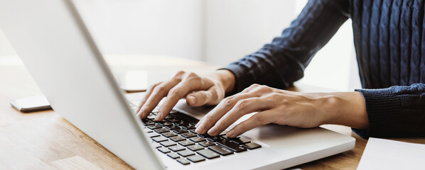 Female hands typing on computer keyboard closeup, business woman or student using laptop at home, online learning, internet marketing, working from home, office workplace, freelance concept, banner