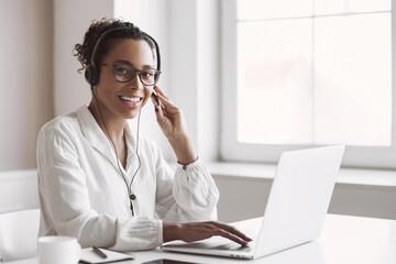 Distance studying, e-learning concept. Woman using laptop computer at home, study online. Student...