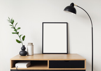 Blank picture frame mockup on white wall. White living room design. View of modern scandinavian...