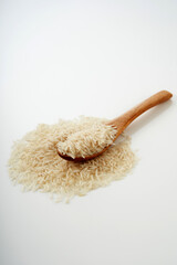 spoon of rice dried food on white background