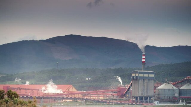 Industrial area on sea coast. Fabrica de Alumina Alcoa in Galicia Spain. Aluminum industry.