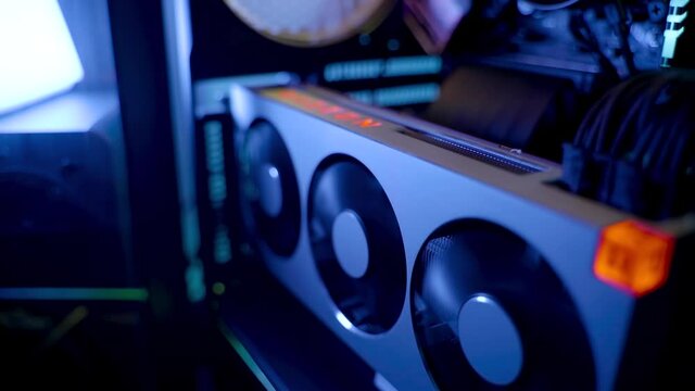 Gaming PC rig with liquid cooling setup and full RGB light inside 