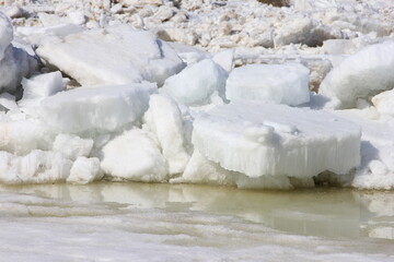 ice chips caused by the melting of ice with the arrival of spring