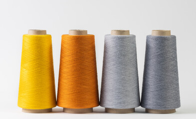 colorful bobbins of thread isolated on white background