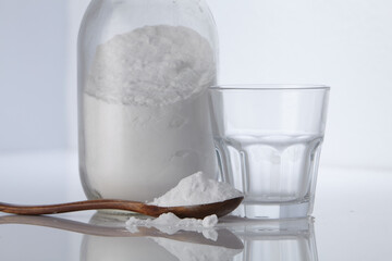 baking soda and vinegar on white background