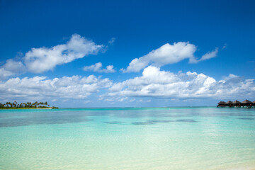 Fototapeta premium Beautiful tropical Maldives island with beach. Sea with water bungalows
