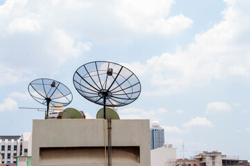 A satellite dish on a building in Bangkok