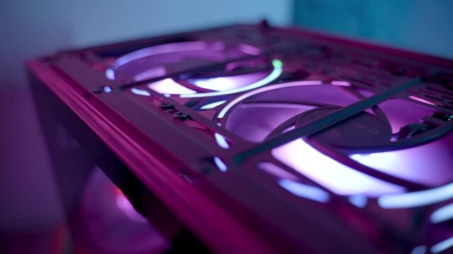 Gaming PC rig with liquid cooling setup and full RGB light inside 