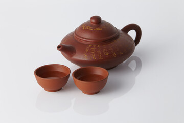 Chinese Tea Cup with Tea Pot on white background
