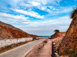 countryside empty rural road with amazing blue sky