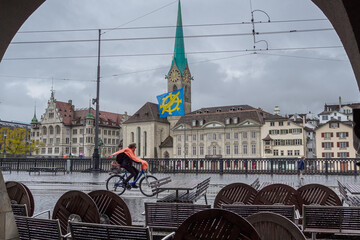 Cyclist in the rain in Zurich, Switzerland