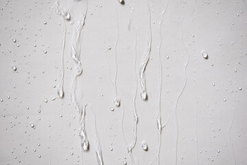 Rain and water droplets are flowing through the walls.