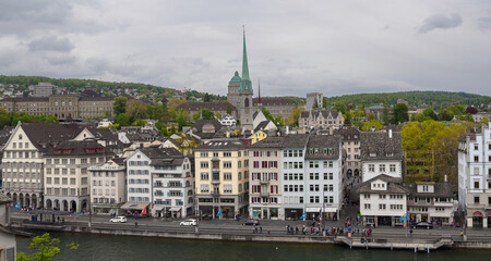 View of historic Zurich city center with famous Fraumunster and Grossmunster Churches at river Limmat
