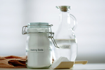 baking soda and vinegar on white background