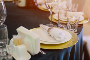 Сatering table with glass stemware at restaurant before party 