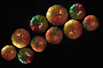 Colorfull Pumpkins on black background
