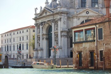 Naklejka premium venetian cathedral with water taxi parked out front
