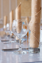 Tables set and salad served for a wedding reception.