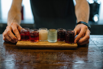 Shot drinks different colors and tastes. 