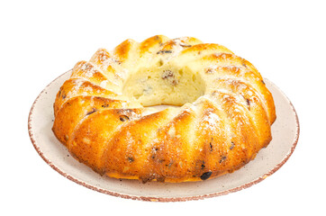 Round delicious biscuit cake with fruit, raisins and dried cranberries. Homemade dessert, baking