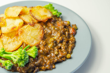 Minced beef hotpot, tender british beef in a warming gravy with carrots and peas, all topped with sliced roast potatoes