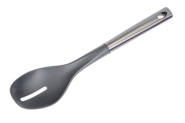Plastic culinary black spoon, slotted spatula, kitchen gadget. Kitchen utensil. Isolated