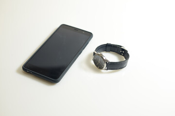 wrist watch and smartphone
