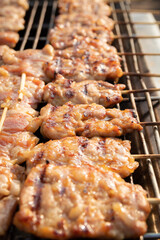 Grilled Pork Skewers on Stove. Thai street food 