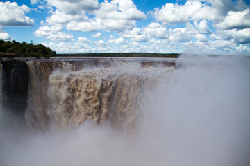 Top of Iguazu Falls and the fog of water sprinkles