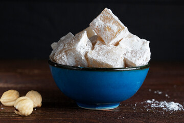 Tea in a glass with Turkish sweets in the