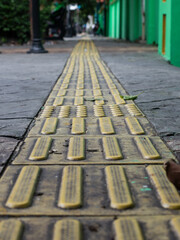 tactile paving for the blind walking on sidewalks