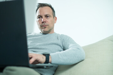 Man using computer at home