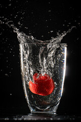 strawberry in water splash