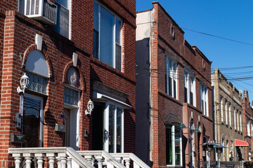Fototapeta premium Row of Beautiful Old Brick Homes in Astoria Queens New York
